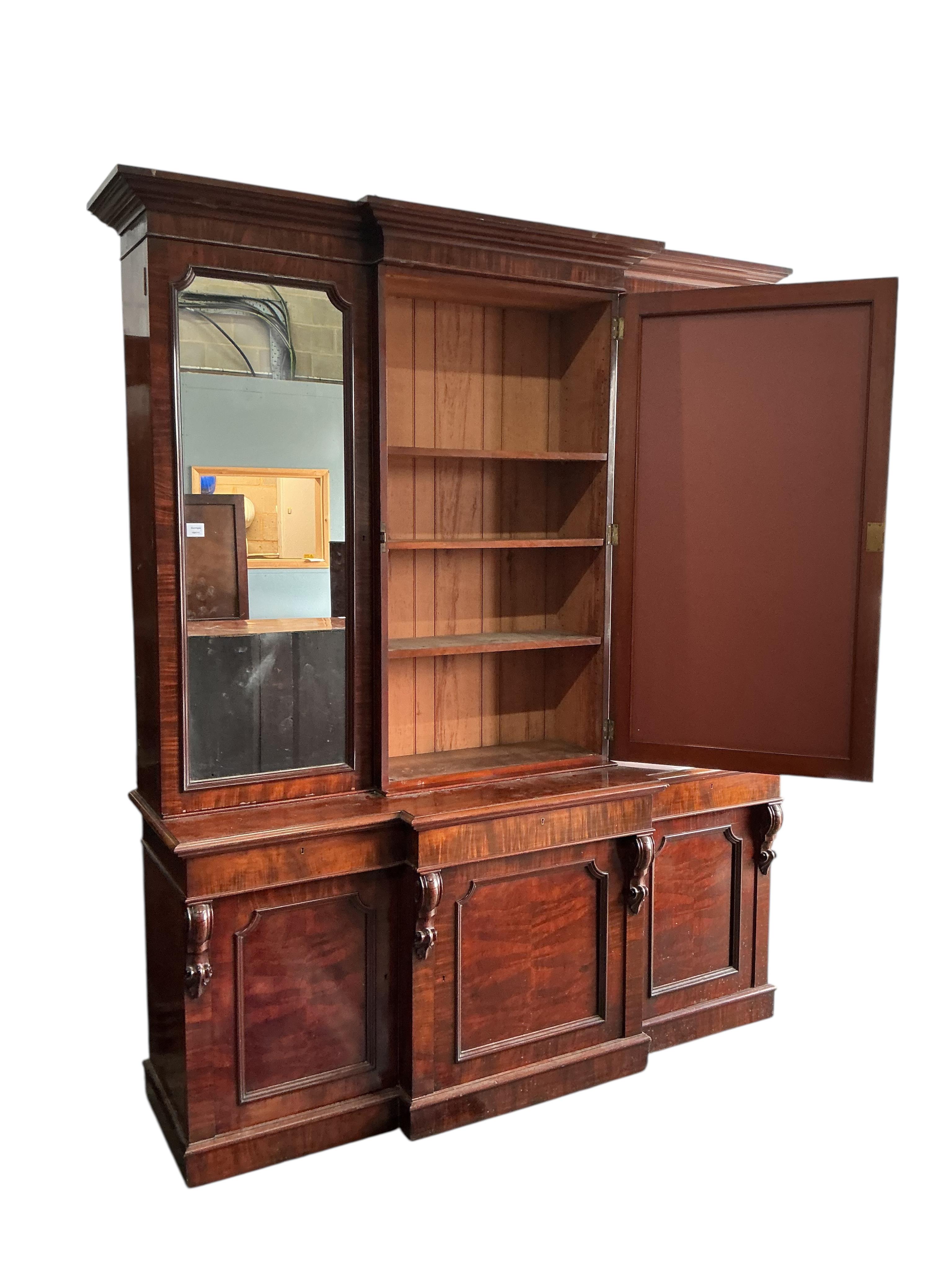A Victorian mahogany breakfront library bookcase, width 200cm, depth 54cm, height 238cm